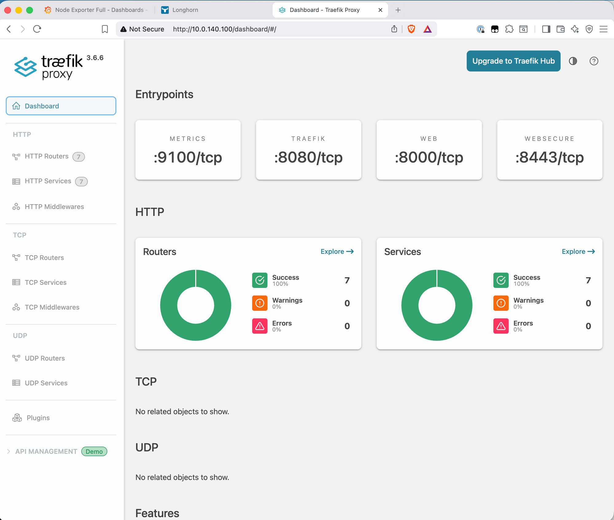Traefik Proxy v3.6.6 dashboard showing four entrypoints (metrics on 9100, traefik on 8080, web on 8000, websecure on 8443) and HTTP section showing 7 routers and 7 services all with Success status The Traefik dashboard at http://10.0.140.100/dashboard/ — 7 HTTP routers and 7 services, all green. The four entrypoints include the two Ingress routes for Grafana and Longhorn alongside Traefik's own internal routes.and zero warnings or errors