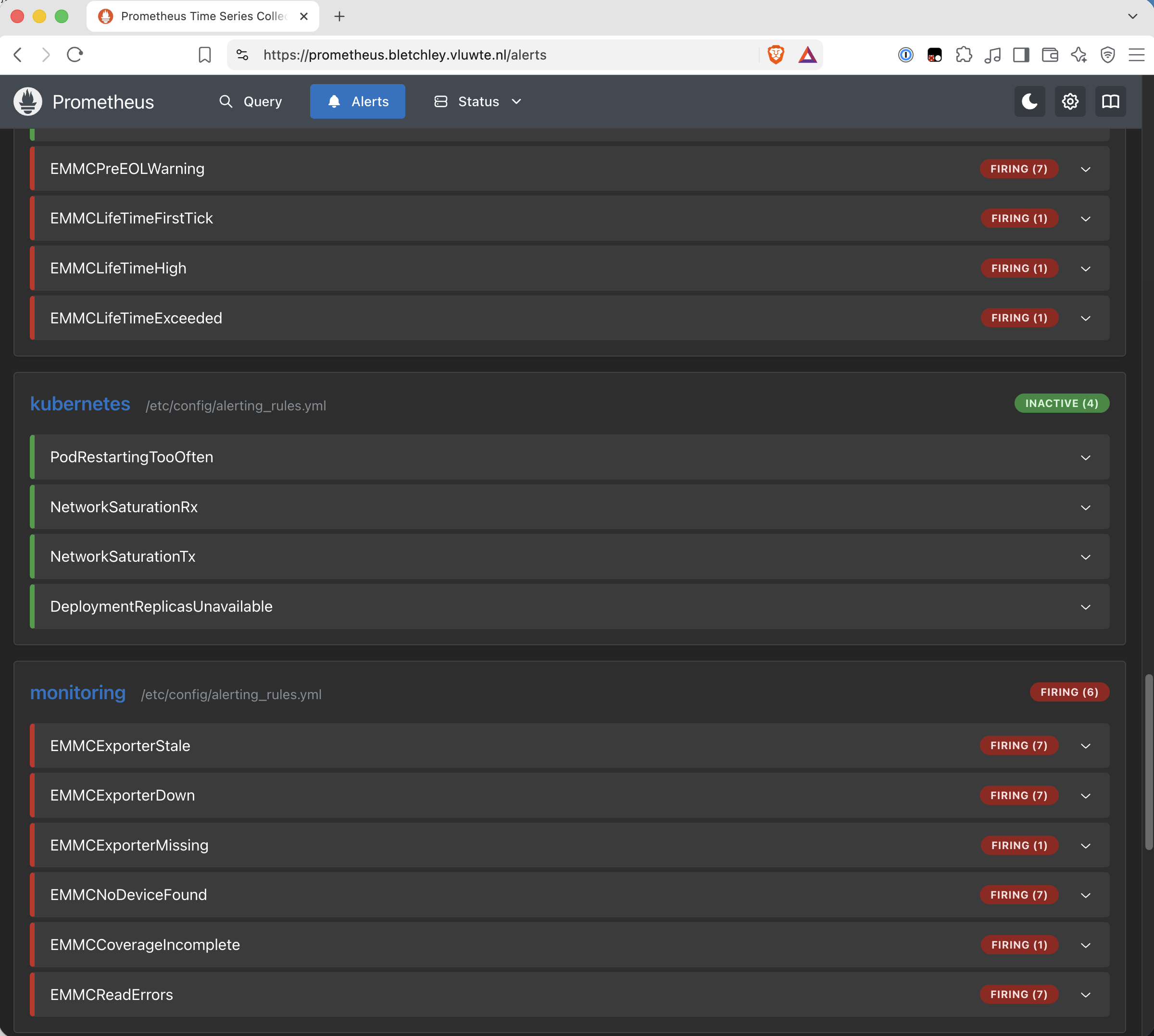 Prometheus alerts page with the same layout. In the hardware group every rule is red: EMMCPreEOLWarning FIRING (7), EMMCLifeTimeFirstTick FIRING (1), EMMCLifeTimeHigh FIRING (1) and EMMCLifeTimeExceeded FIRING (1). The kubernetes group between them is unchanged, INACTIVE (4). The monitoring group reads FIRING (6), with EMMCExporterStale FIRING (7), EMMCExporterDown FIRING (7), EMMCExporterMissing FIRING (1), EMMCNoDeviceFound FIRING (7), EMMCCoverageIncomplete FIRING (1) and EMMCReadErrors FIRING (7).