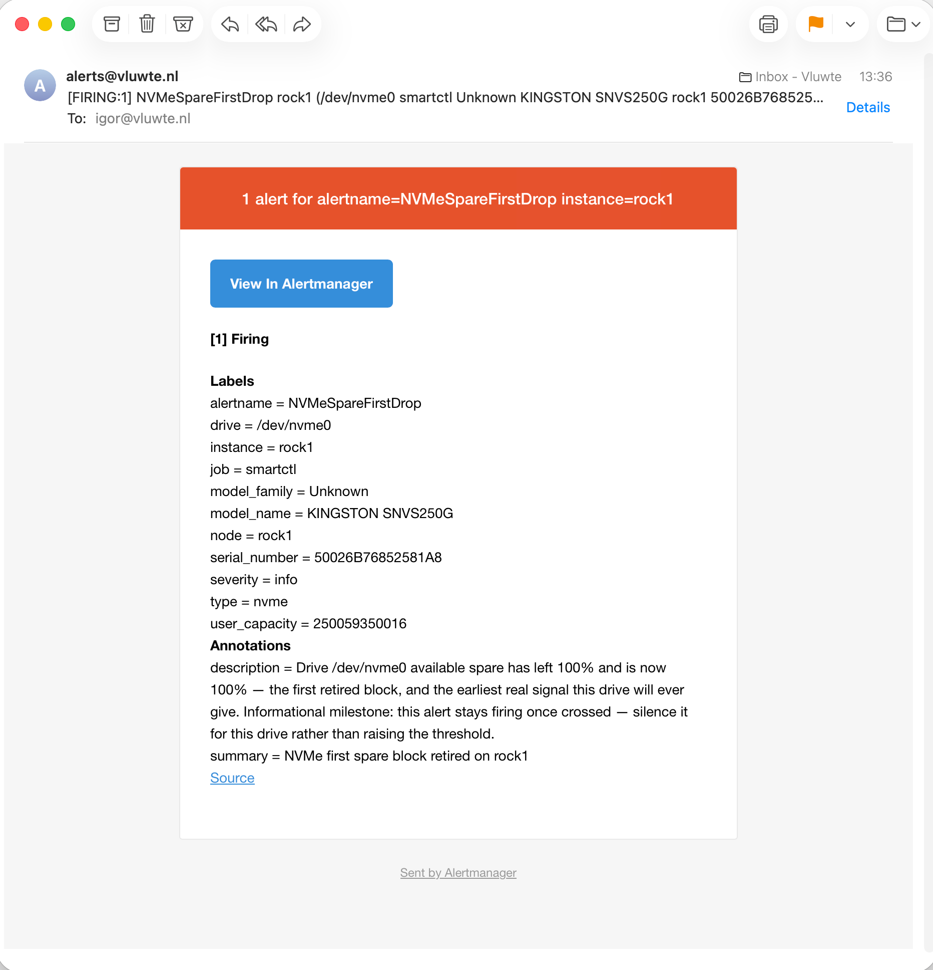 Delivered Alertmanager email from alerts at vluwte.nl, subject FIRING colon 1, NVMeSpareFirstDrop rock1. The labels block lists alertname NVMeSpareFirstDrop, drive /dev/nvme0, instance rock1, job smartctl, model name KINGSTON SNVS250G, node rock1, serial number 50026B76852581A8, severity info and type nvme. The annotations block contains the summary NVMe first spare block retired on rock1 and a description ending with the sentence about silencing the alert for this drive rather than raising the threshold.